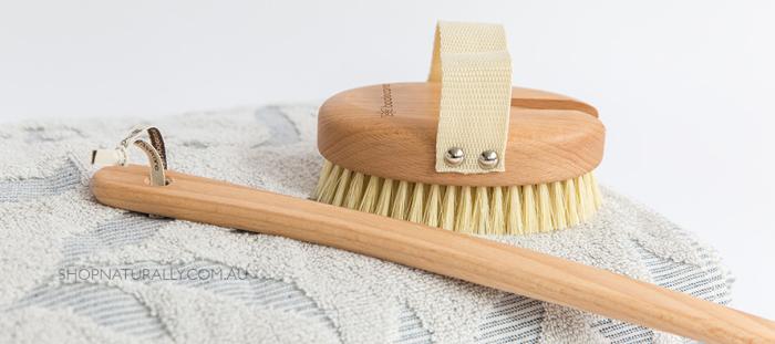 How do you clean a dry body brush?