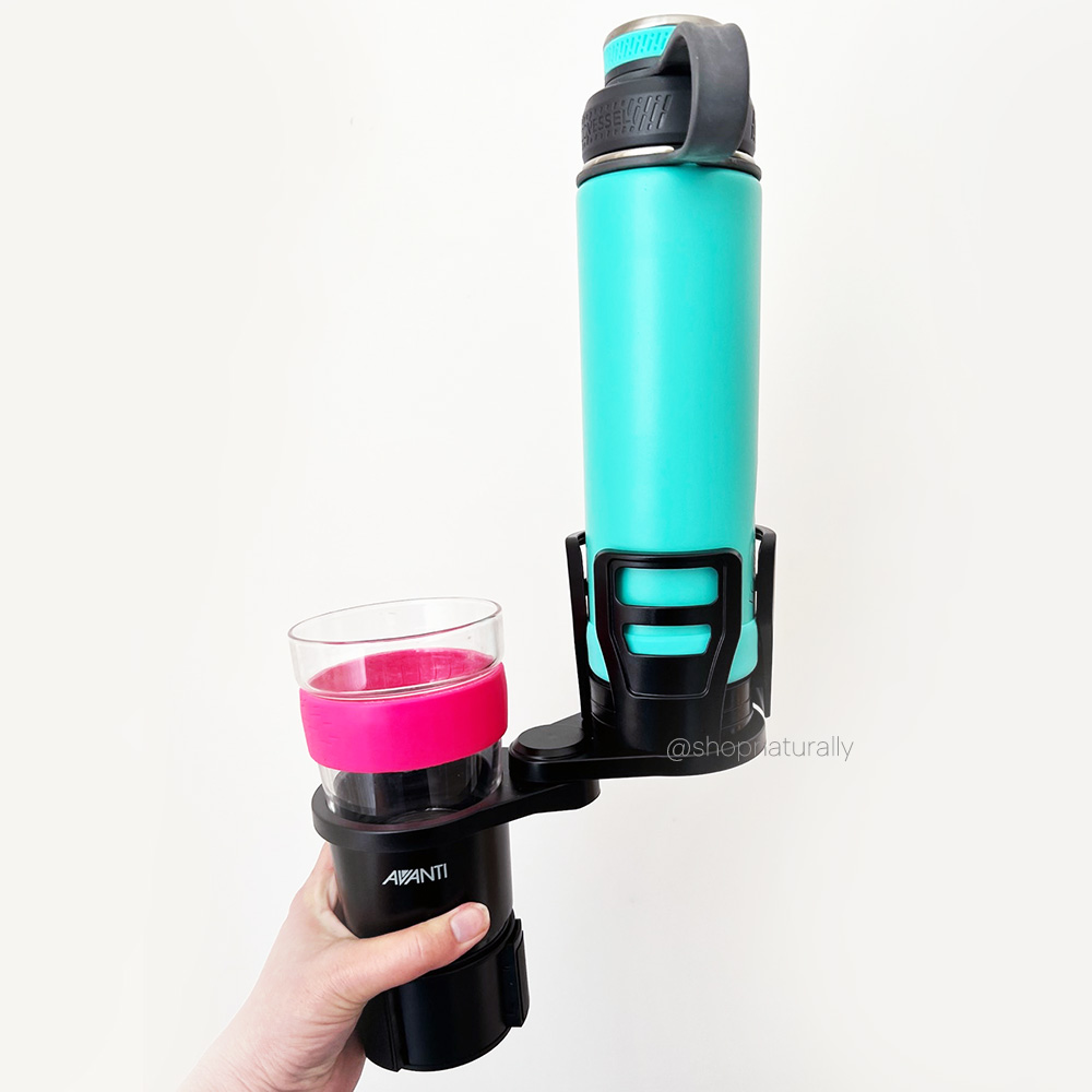 Avanti Car Cup Holder holding a coffee cup and a water bottle